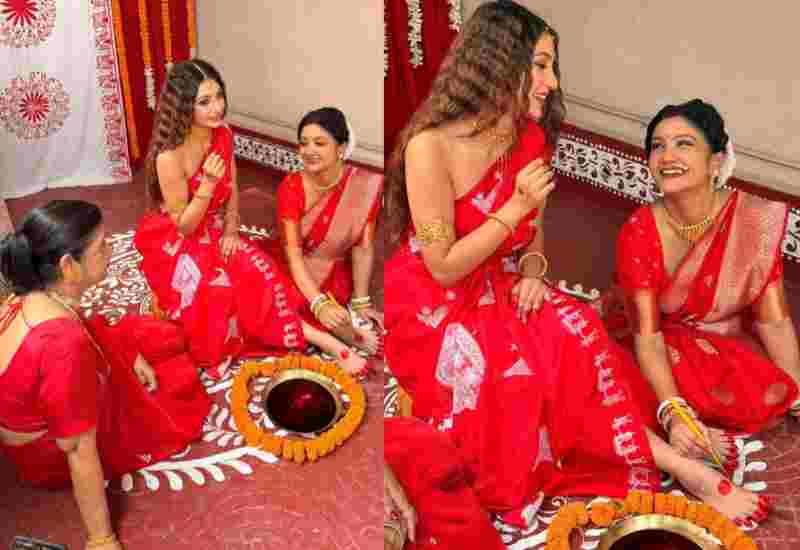মেহেন্দি নয়, বাঙালিয়ানায় আলতা উৎসব! লাল শাড়িতে নজর কাড়লেন অনন্যা গুহ